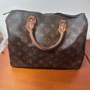 Pre-Owned Authentic Vintage Louis
Vuitton Monogram Speedy 30
